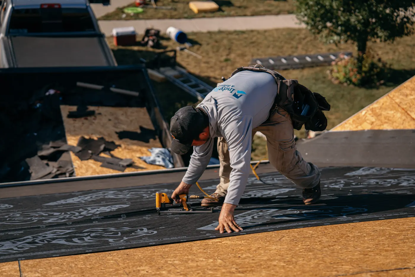 Tarping and dry-in on a Crossfields commercial roof